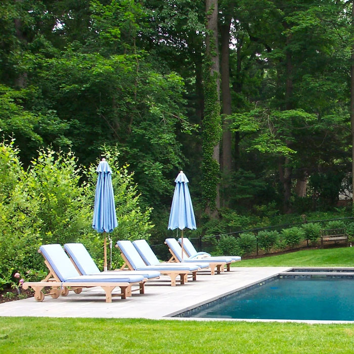 pool patio with lounge chairs